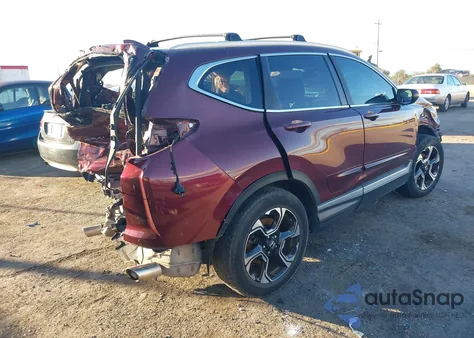 2017 Honda Cr-V Touring z USA, uszkodzony, nr VIN 2HKRW2H94HH674672